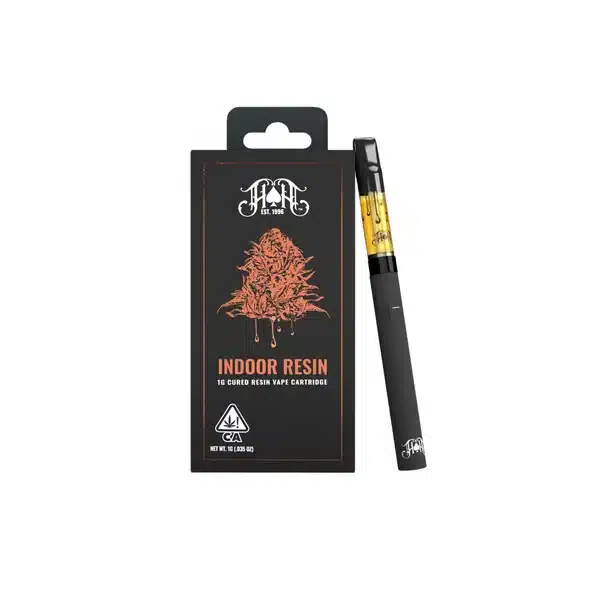  A 1g indoor resin vape cartridge of Raspberry Cough by Heavy Hitters, featuring vibrant branding and sleek design, perfect for those seeking a sweet and energizing experience.