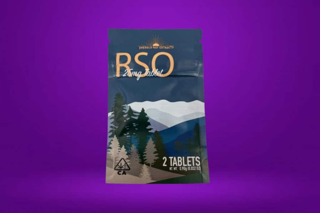 Emerald Bay Extracts RSO 25mg Tablets – A high-potency cannabis tablet pack displayed against a deep purple background.